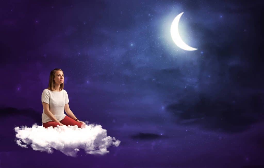 woman sitting on cloud night sky moon